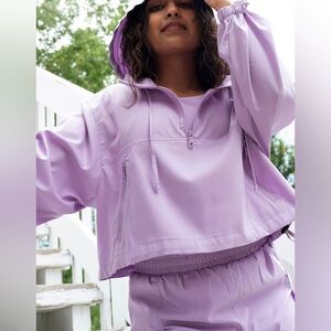 Girlfriend Collective Huddle Half-Zip Lightweight Hooded Windbreaker in Lilac XS